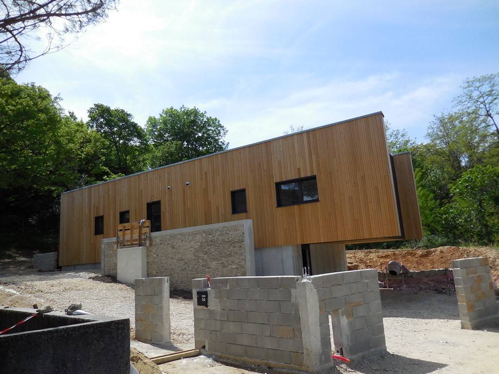 Maison contemporaine en bois à toit plat en Rhône Alpes