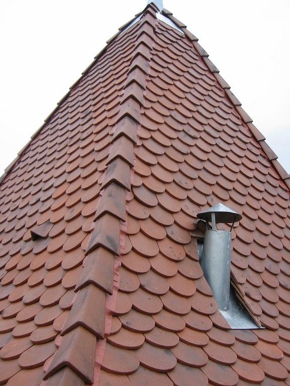 Sortie de ventilation zinc sur toiture tuile plate