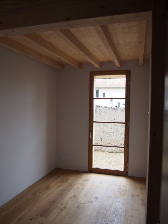 Réalisation d'une maison contemporaine en bois à Lentilly (Rhône)